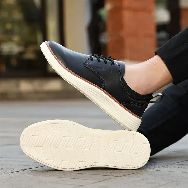 Carvelli Leather Sneakers in black, featuring lightweight rubber sole and stretch-fit ankle. Perfect casual sneakers for men's everyday wear.