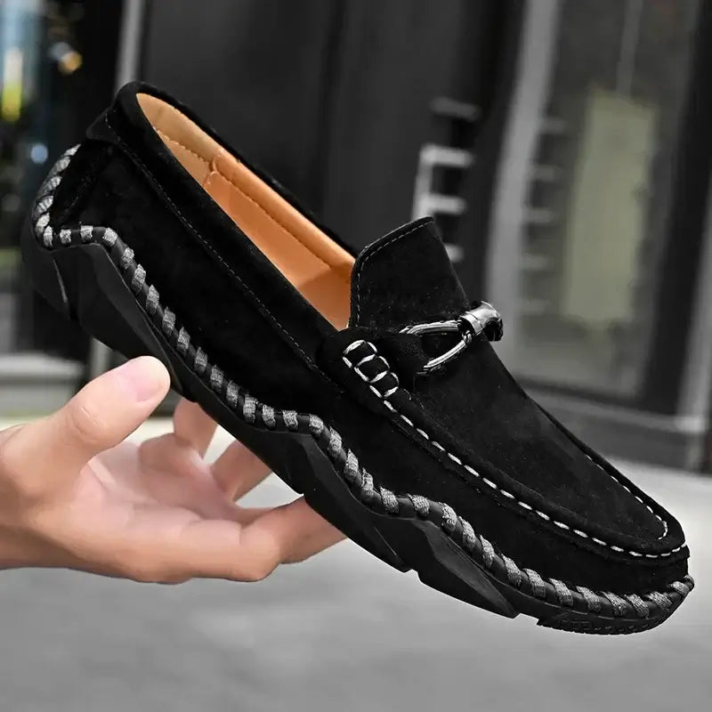 Fiorenzo Hand-Stitched Loafers in black suede showcasing elegant slip-on design and premium craftsmanship for formal men's wear.