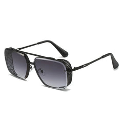 Stylish UV protection sunglasses with black metal frames and gradient lenses, perfect for sun safety and modern style.