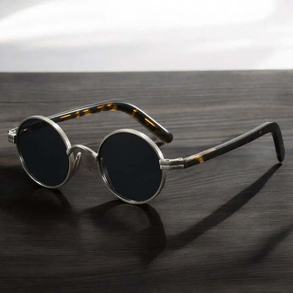 Bellini Shades vintage-style UV protection sunglasses with sleek metal frame and tortoiseshell arms, perfect for modern style and driving.