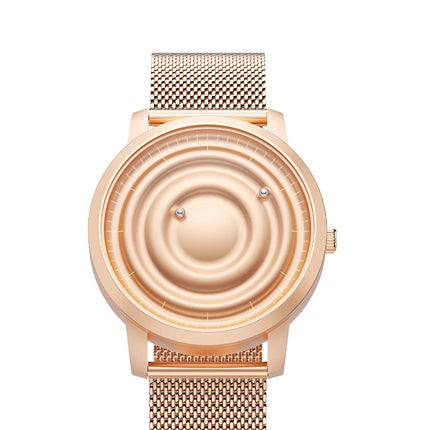 Orbitra Magnetic Watch with a gold mesh band, featuring a unique magnetic ball system for time display, minimalist design.
