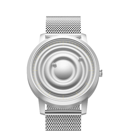 Orbitra Magnetic Watch with minimalist design and magnetic ball bearing system on silver mesh band.