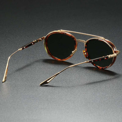 Altura Signature Shades round polarised sunglasses with alloy frame on dark surface