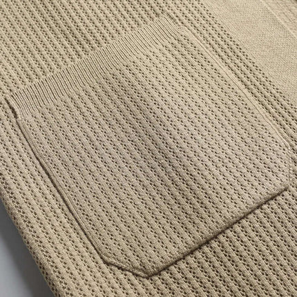Close-up of ribbed texture and pocket on Archer Cardigan, a men's winter sweater, showcasing soft, breathable knit for comfort and layering.