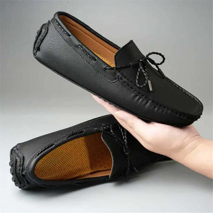 Ashford Leather Loafers in black, showcasing premium leather and slip-on comfort, perfect for formal occasions and elegant style.