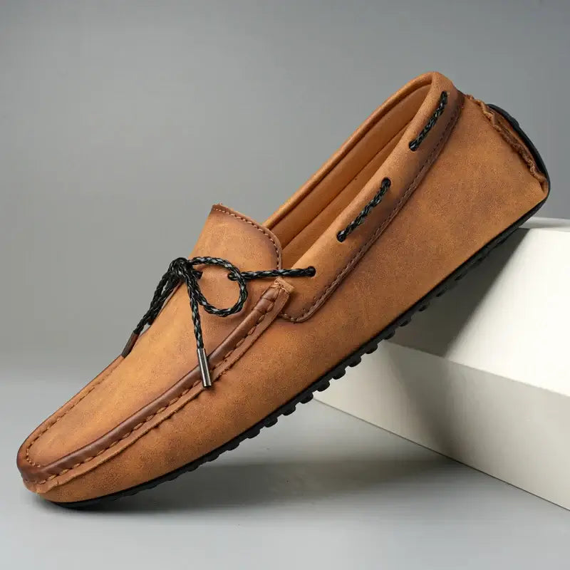 Ashford Leather Loafers in premium tan leather, showcasing slip-on elegance and formal style with cushioned comfort and luxury features.