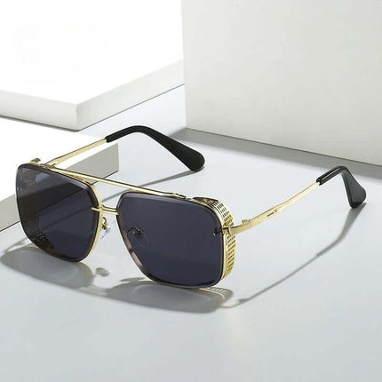 Astoria Shades vintage sunglasses with gold frame and dark lenses.
