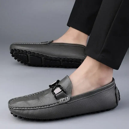 Elegant Benson Leather Loafers for men in grey, slip-on formal style with cushioned footbed and durable rubber outsole. Ideal for luxury comfort.