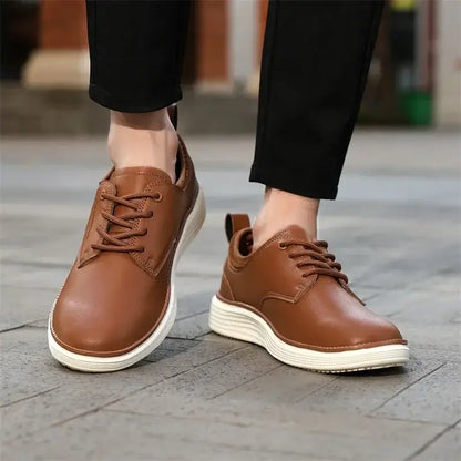 Carvelli Leather Sneakers: Men's casual sneakers in brown leather, lightweight, comfortable for everyday wear and travel.