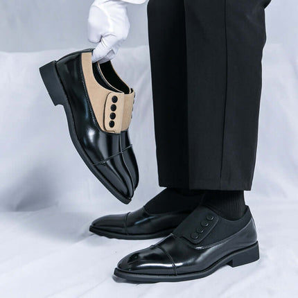 Giotto dual tone men's dress shoes in black leather with suede panel, sculpted cap toe and cushioned insole.