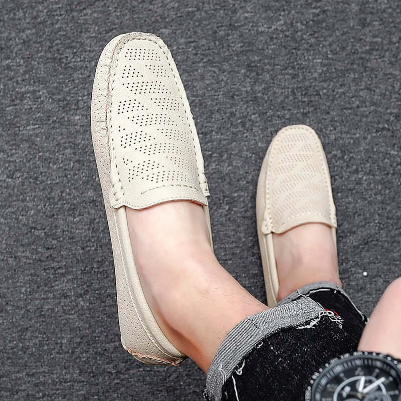 Giuliano Leather Loafers showcasing elegant perforated design and slip-on comfort.