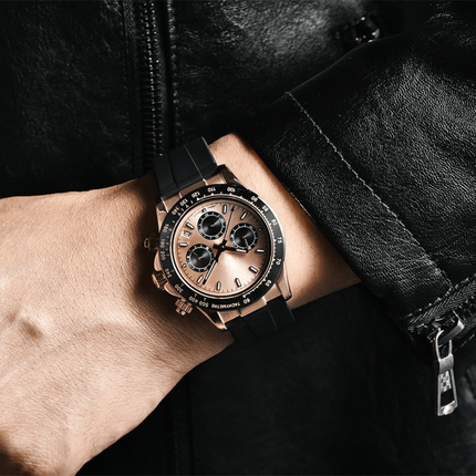 Person wearing Imperio Chronograph – Rose Noir Edition, luxury watch with rose gold case and black strap, showcasing bold engineering.