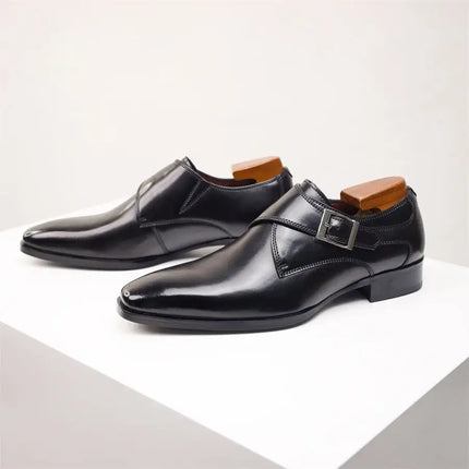Lancaster Dress Shoes in genuine leather with metal buckle and pointed toe on display, perfect for casual or formal settings.