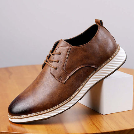 Livorno Hybrid Shoes in brown leather showcasing slip-on design with cushioned footbed and flexible sole on a wooden surface