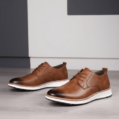 Livorno Hybrid Shoes handcrafted from genuine leather with cushioned footbed and slip-on design displayed on a modern floor.