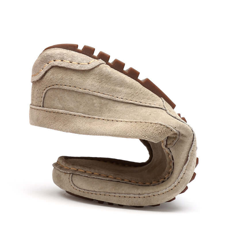 Lucera Slip-On Loafers showcasing flexible suede and rubber sole design, highlighting luxury, comfort and versatility for men's formal and casual wear.