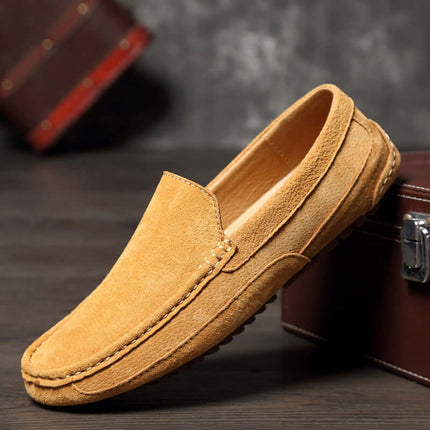 Lucera Slip-On Loafers in soft suede with flexible sole, showcasing elegance and comfort. Ideal for formal wear. Luxury men's leather loafers.