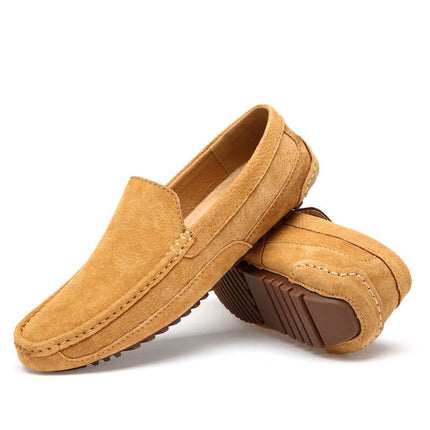 Lucera Slip-On Loafers in tan suede, showcasing minimalist design, flexible sole, and elegant style for formal and casual wear.