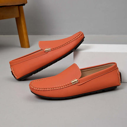 Marco Leather Loafers in orange on display showing their premium hand-stitched design and cushioned insole, ideal for formal and casual occasions.