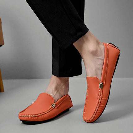 Marco Leather Loafers in premium orange leather, showcasing hand-stitched design and slip-on comfort for formal and casual occasions.