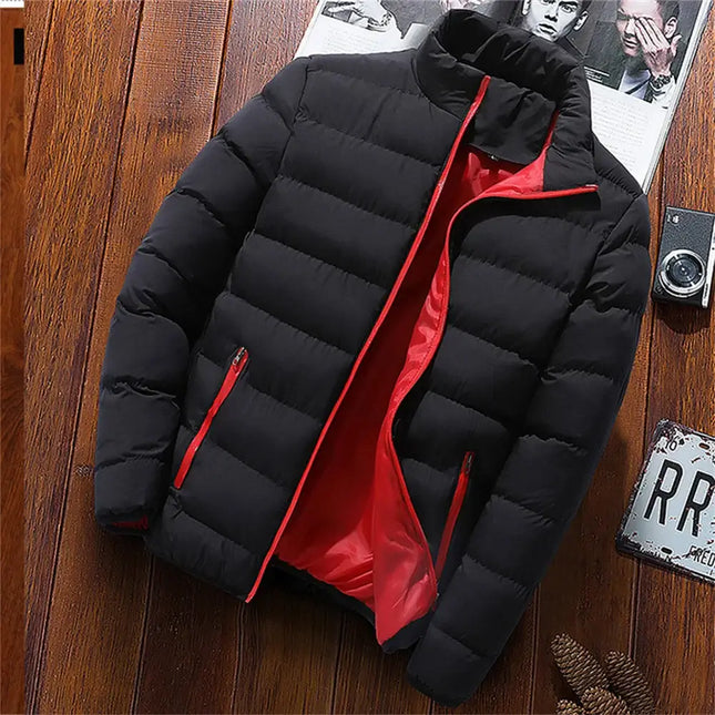 Men's casual puffer jacket with smooth collar and full front zipper, black exterior with red interior, laid on wooden surface.
