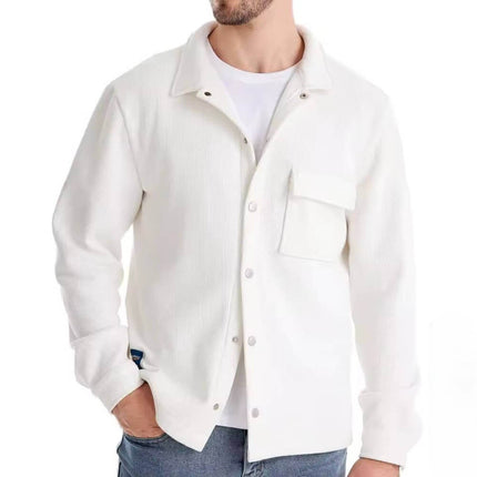 Model wearing men's premium winter jacket in white with casual jeans, showcasing functional front pockets and comfortable fit.
