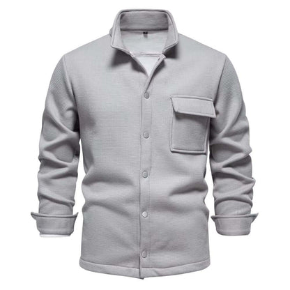 Men's premium winter jacket in light gray, featuring a stylish design with button closure and chest pocket.