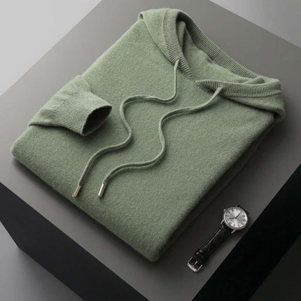 Monaco Hoodie in green made from ultra-soft merino wool, perfect men's winter sweater for layering, offering warmth and comfort for everyday wear.