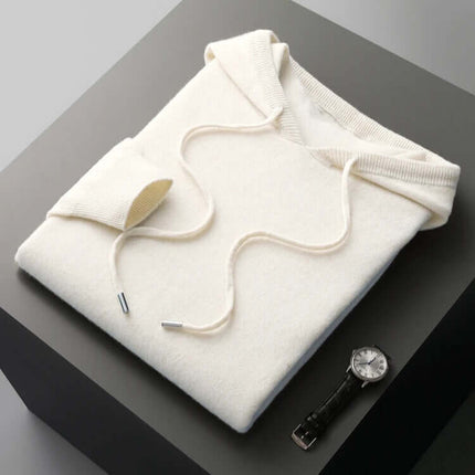 Monaco Hoodie in cream, folded to show soft merino wool, perfect men's winter sweater for warmth, comfort, and style, ideal for everyday wear.