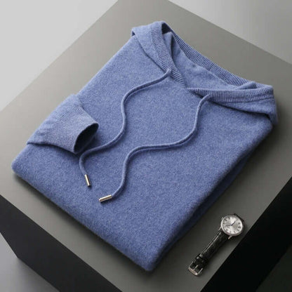 Monaco Hoodie in soft blue, crafted from 100% merino wool. Ultimate men's winter sweater offering unmatched warmth and comfort.