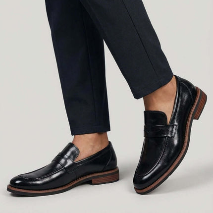Montovani Leather Penny Loafers showcasing sleek leather and luxury style for men's formal wear and slip-on comfort.