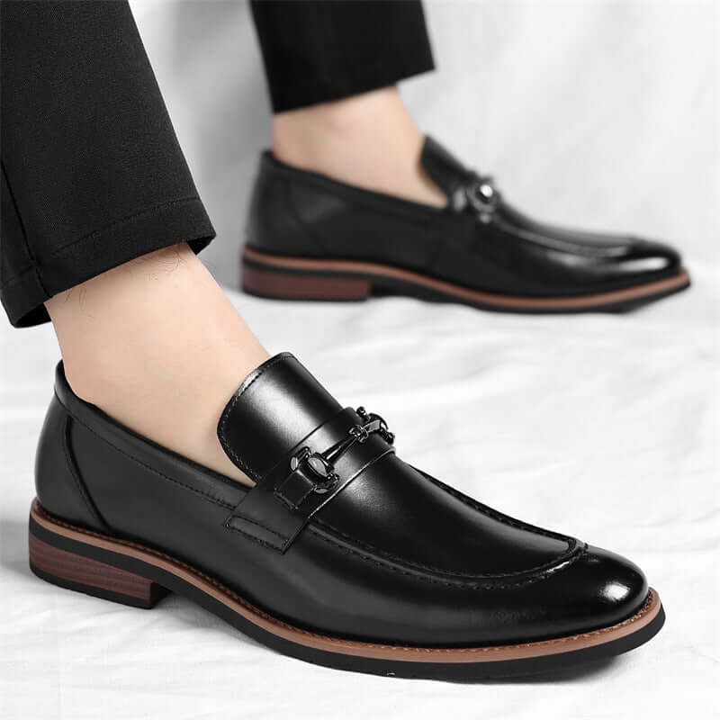 Montovani Leather Loafers showcasing sleek design and premium black leather for luxurious, formal style and confident, slip-on comfort.