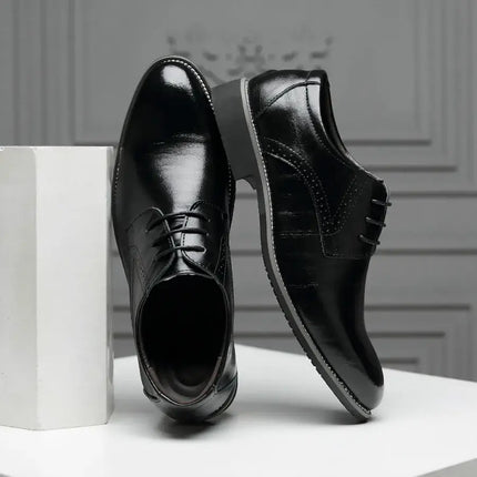 Roma Wingtip Dress Shoes in black synthetic leather with subtle brogue detailing, showcasing modern style and orthopedic comfort.