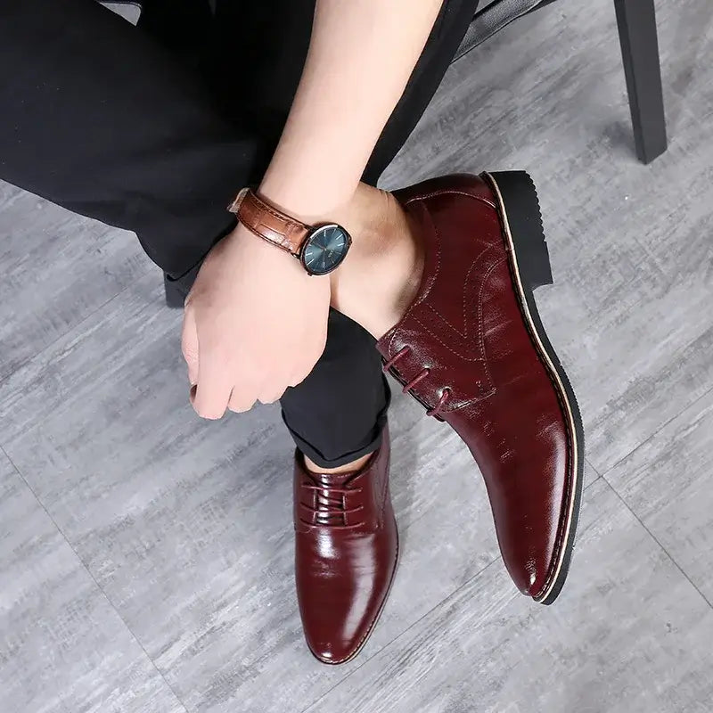 Roma Wingtip Dress Shoes with brogue detailing displayed on a man's foot, featuring premium synthetic leather and orthopedic insoles.