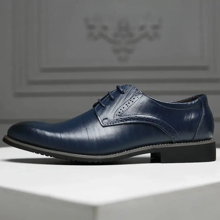 Roma Wingtip Dress Shoes in blue synthetic leather with brogue detailing, featuring an orthopedic insole for comfort and style.