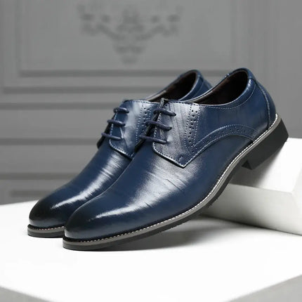 Roma Wingtip Dress Shoes with Italian-inspired brogue detailing in blue synthetic leather, offering comfort and style for any occasion.