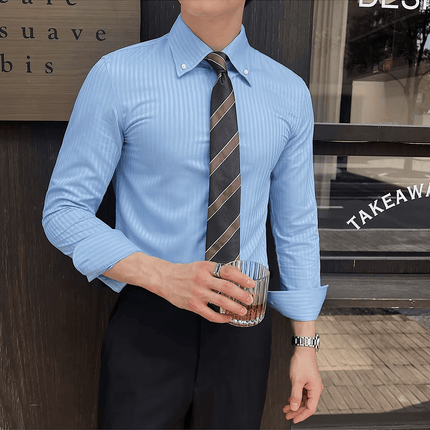 Savile Dress Shirt - tailored fit blue men's casual shirt with vertical stripes, perfect for work or social occasions, held by a man.
