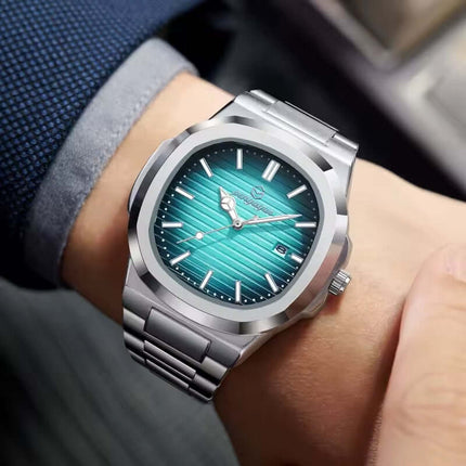 Siena 40 – Integrated Classic men's watch with modern design and 40mm silver case, worn on a wrist, showcasing blue dial.