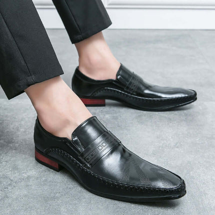 Silvano Leather Loafers for men in black Italian leather, featuring a decorative strap, slip-on style, and side stitch detailing for formal elegance.