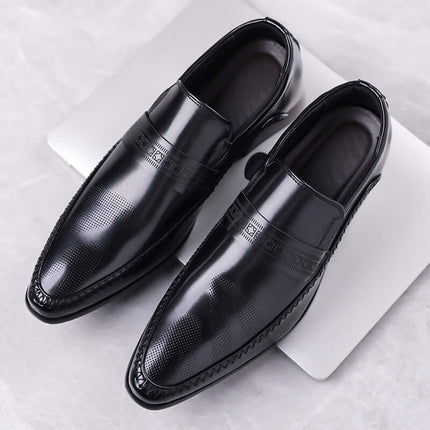 Silvano Leather Loafers, premium men's slip-on Italian leather shoes with elegant decorative strap and stitching, ideal for formal occasions.