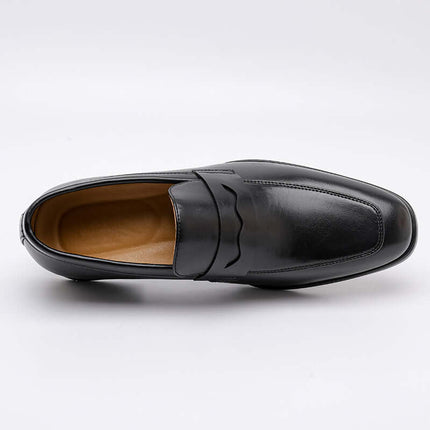 Tuscano Leather Loafers in sleek black, showcasing premium leather, cushioned insole, and elegant slip-on design for men's formal style.