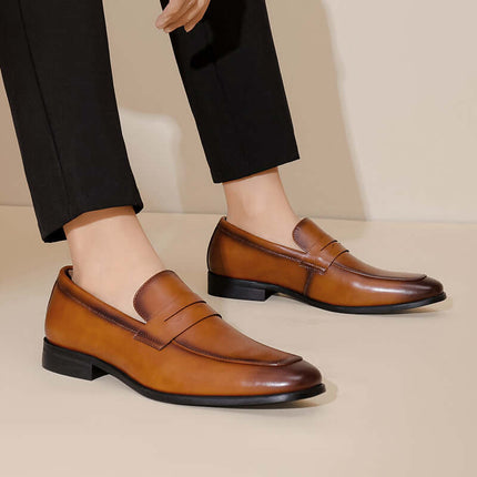 Tuscano Leather Loafers showcasing luxury, slip-on comfort for formal men's wear. Premium leather design with non-slip sole and cushioned support.