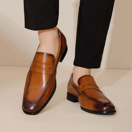 Tuscano Leather Loafers showcasing premium elegance and slip-on comfort for the modern gentleman, crafted from genuine leather for formal style.
