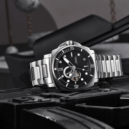 Valenor Automatic Diver Signature watch with stainless steel band on industrial background