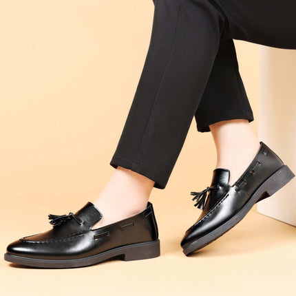 Valente Leather Tassel Loafers showcased on a model, highlighting slip-on comfort and classic tassel design for men's formal elegance.