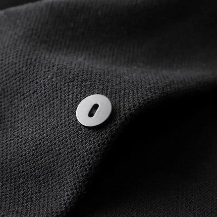 Close-up of Vellano Knit Cardigan's soft wool blend and button detail, highlighting its warm and cozy comfort for men's winter knitwear.
