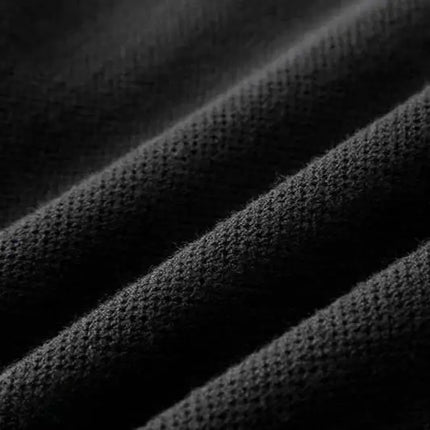 Close-up of soft ribbed wool blend fabric from Vellano Knit Cardigan, showcasing premium warmth and comfort in men's winter knitwear.