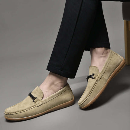 Elegant Veneto Suede Loafers showcasing Italian craftsmanship with sleek design and slip-on comfort. Ideal for formal men's style.