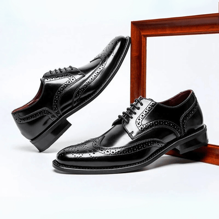 Vicenza Dress Shoes with genuine leather, wingtip brogue detailing, glossy finish, orthopedic insoles, and stacked heel.