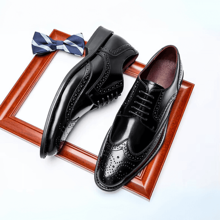 Vicenza Dress Shoes - genuine leather brogues with wingtip detailing, orthopedic insoles, and a glossy finish displayed elegantly.